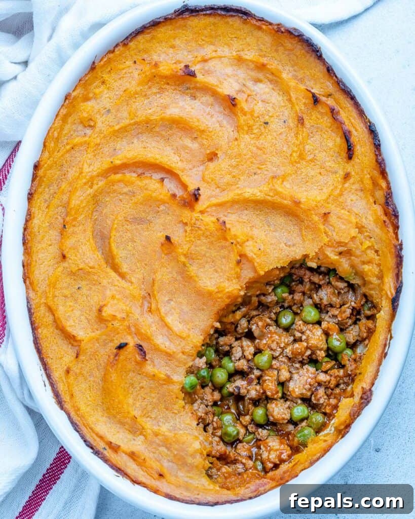 Wholesome Sweet Potato Shepherd's Pie 2 top view of an oval dish with a Healthy sweet potato shepherd's pie