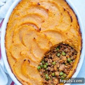 top view of an oval dish with a Healthy sweet potato shepherd's pie