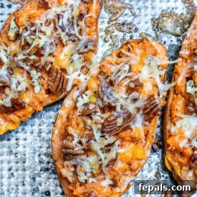 Delicious twice-baked sweet potatoes with melted cheese and pecans