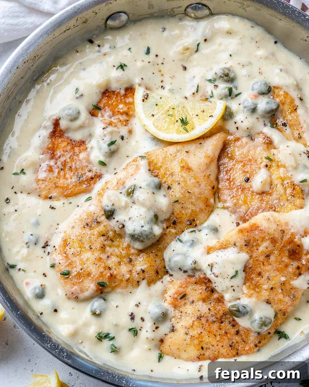 Effortless Creamy Chicken Piccata 2 seared chicken breast in a lemon piccata sauce.