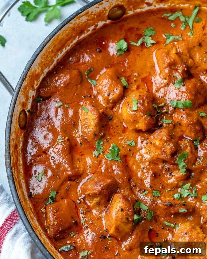 Quick & Creamy Butter Chicken 9 top view of healthy Indian butter chicken recipe in a pan