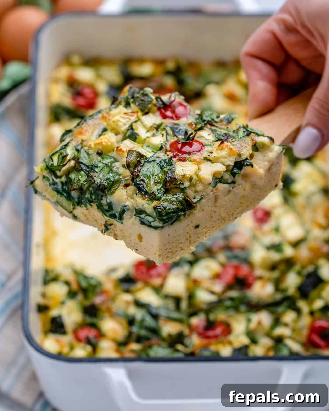 Healthy quiche recipe, showcasing the rich texture and colorful vegetables.
