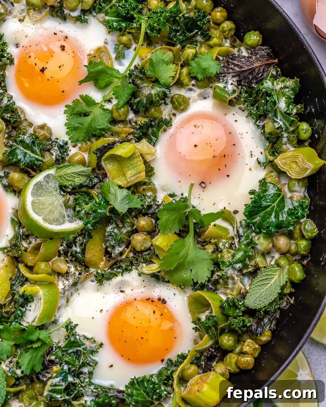 shakshuka recipe with poached eggs and greens