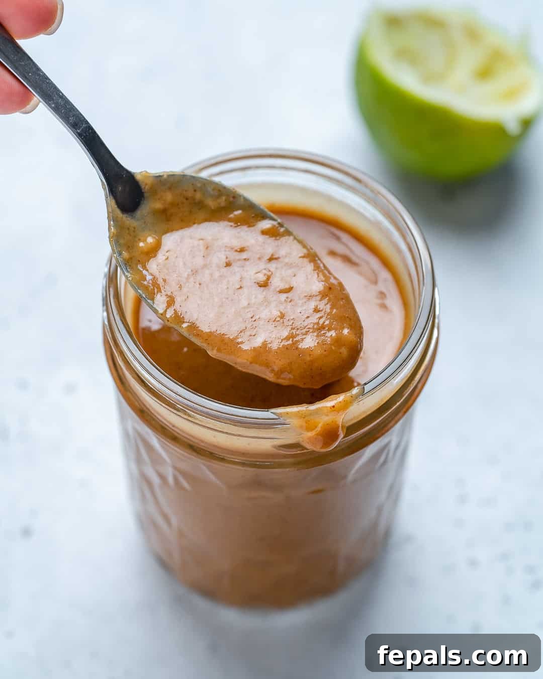 Savory Thai Peanut Sauce 2 Spoonful of Healthy Thai Peanut Dressing in jar