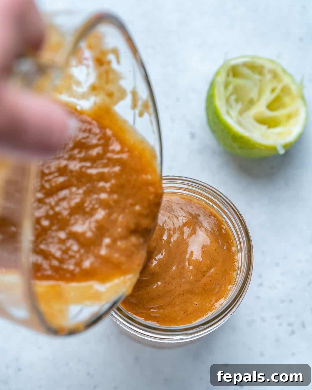 Savory Thai Peanut Sauce 7 Pour Healthy Thai Peanut Sauce into serving bowl or jar.
