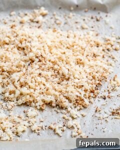 Crispy Cauliflower Pizza Crust 17 Spread the cauliflower "rice" on a baking sheet and bake until golden.