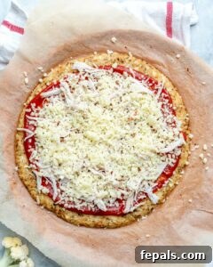 Crispy Cauliflower Pizza Crust 21 Pizza sauce and cheese toppings are added over the cauliflower crust and baked until melted.