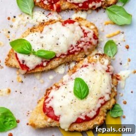 Crispy Air Fryer Chicken Parmesan 10 Air fryer chicken parmesan close up with sauce and cheese