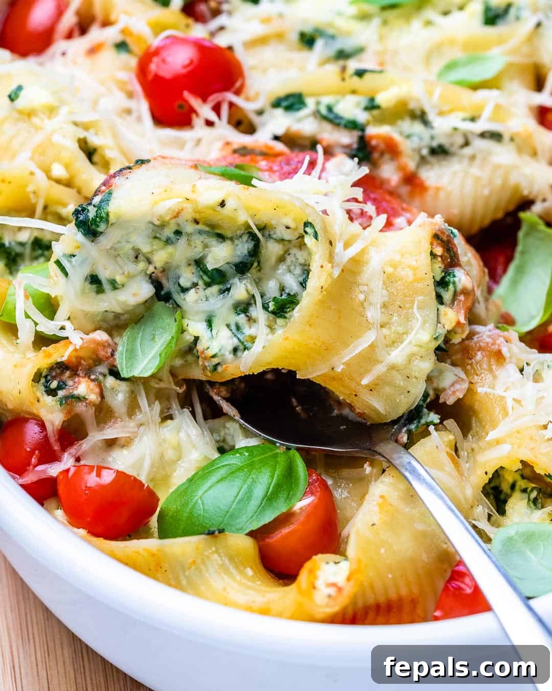 Spinach Ricotta Pasta Pockets 9 spoon with pasta