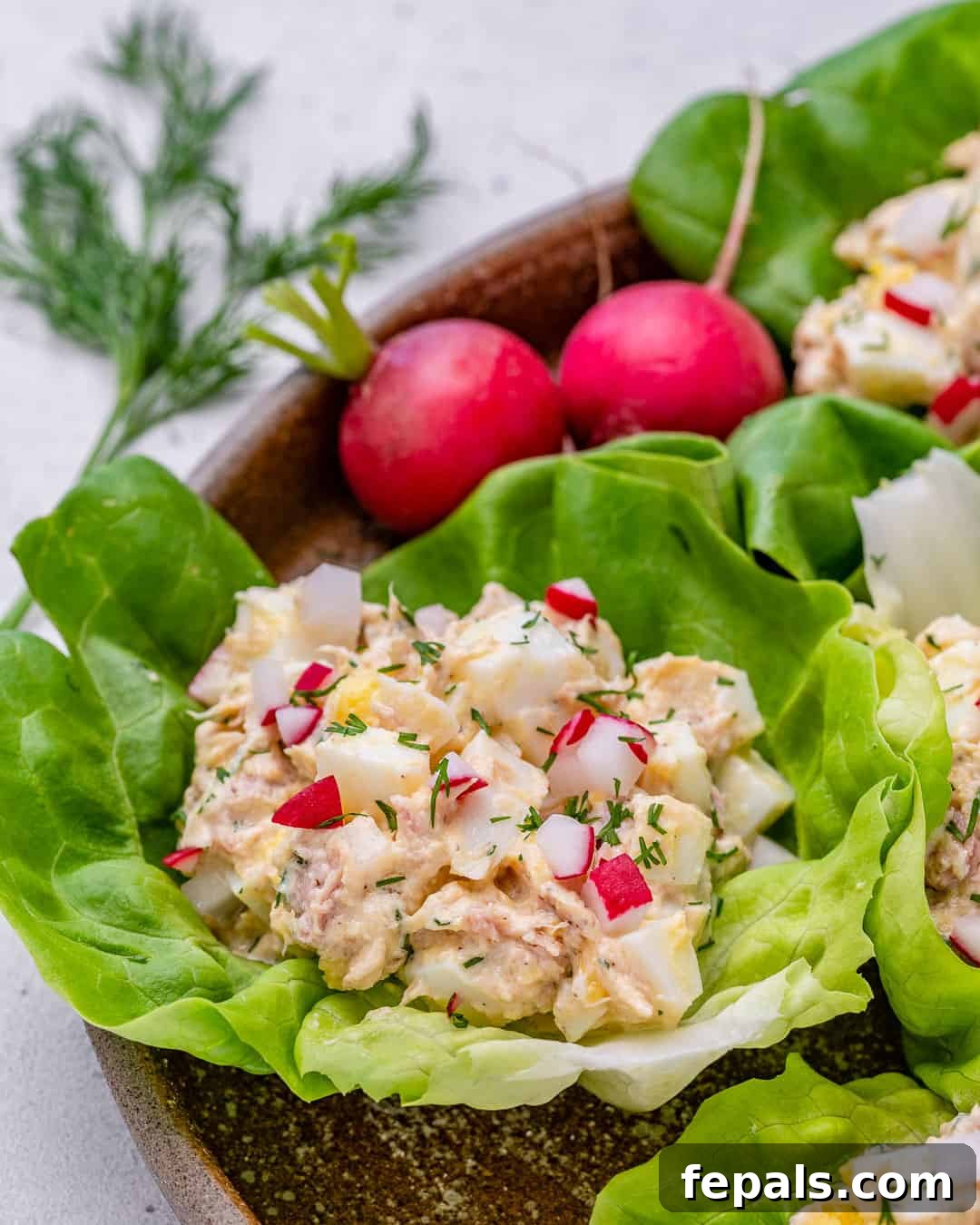 Low Carb Tuna Salad Lettuce Cups 4 side view of tuna salad in lettuce wrap