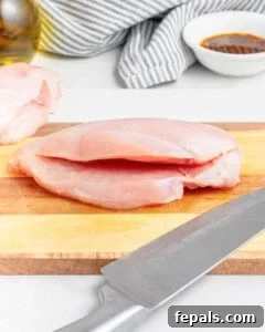 Chicken breast sliced in the middle to make a pocket.