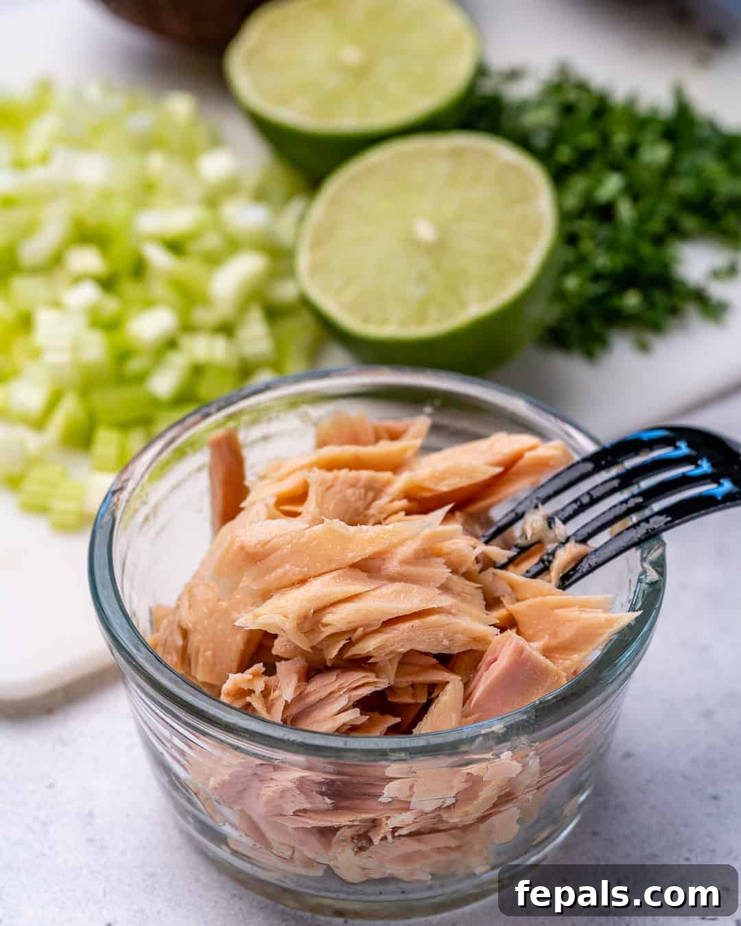 Wholesome Avocado Tuna Blend 3 canned tuna in a bowl for the tuna salad