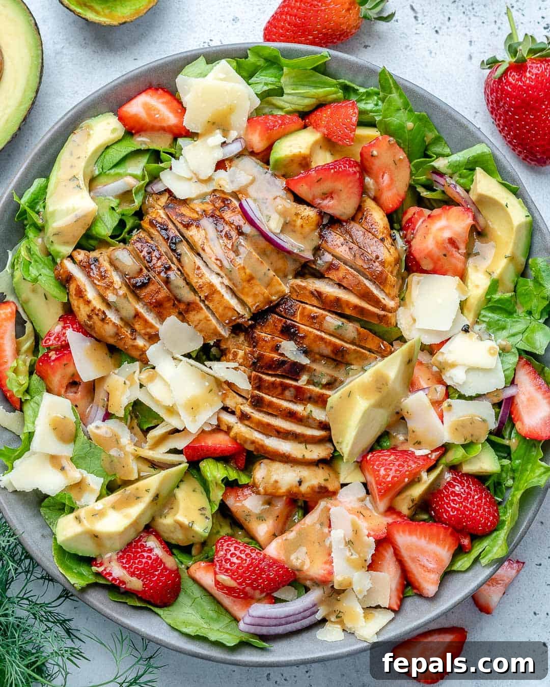 Vibrant Strawberry Chicken Salad 2 top view of healthy chicken salad with strawberries in a bowl