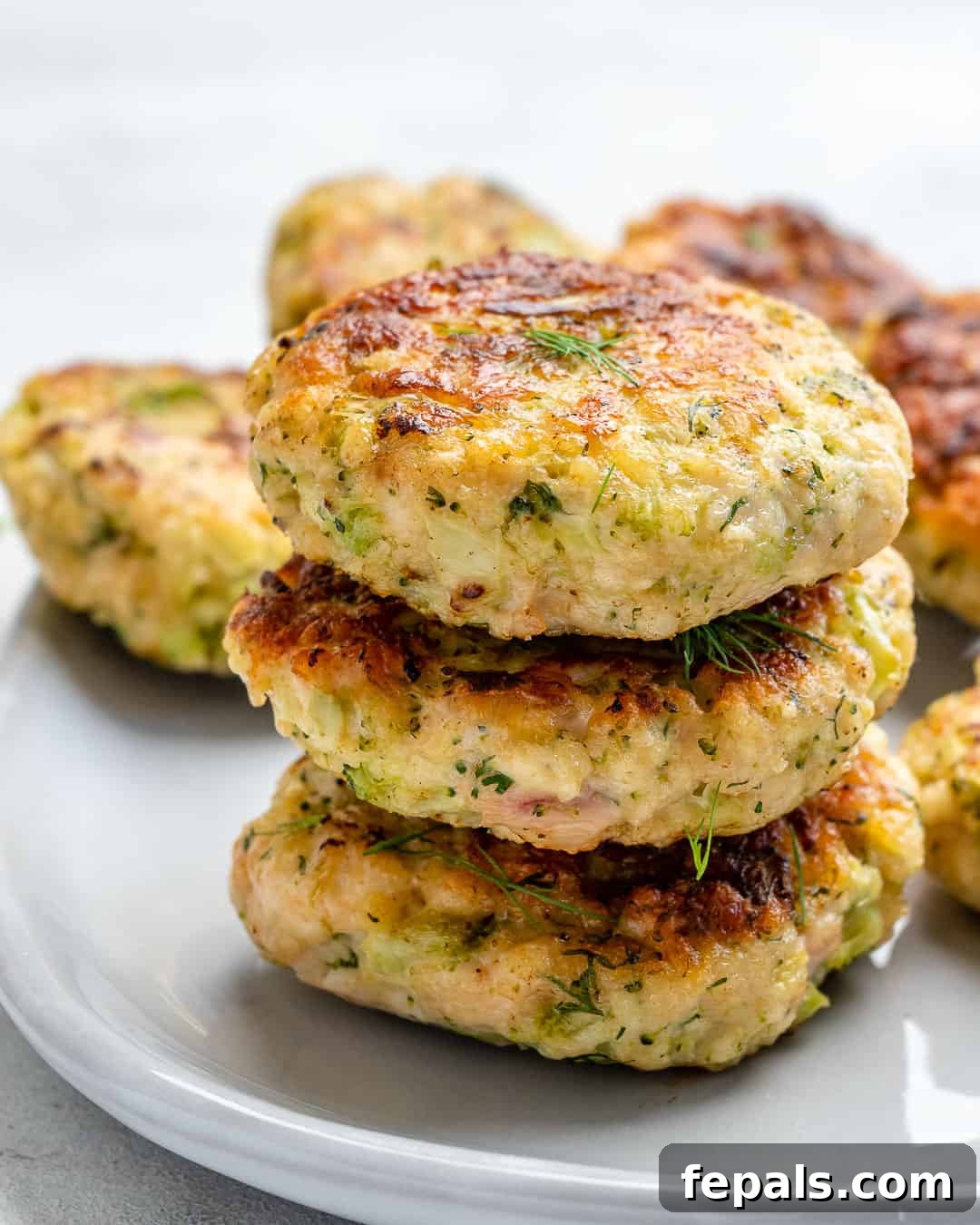 Savory Chicken & Broccoli Bites 5 3 chicken chicken patties stacked together