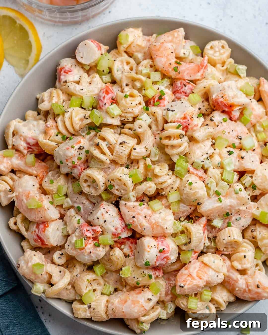 Top view of another shrimp pasta dish in a bowl, showcasing vibrant colors