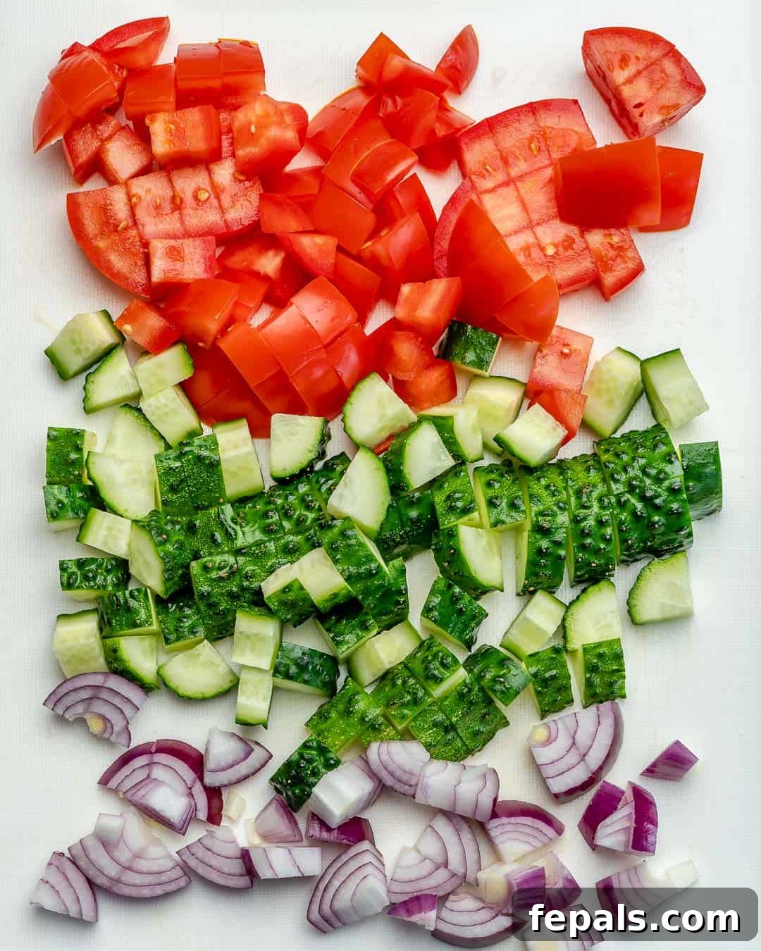 Zesty Shrimp Avocado Salad 4 chopped onion, cucumber, and tomatoes on a white board