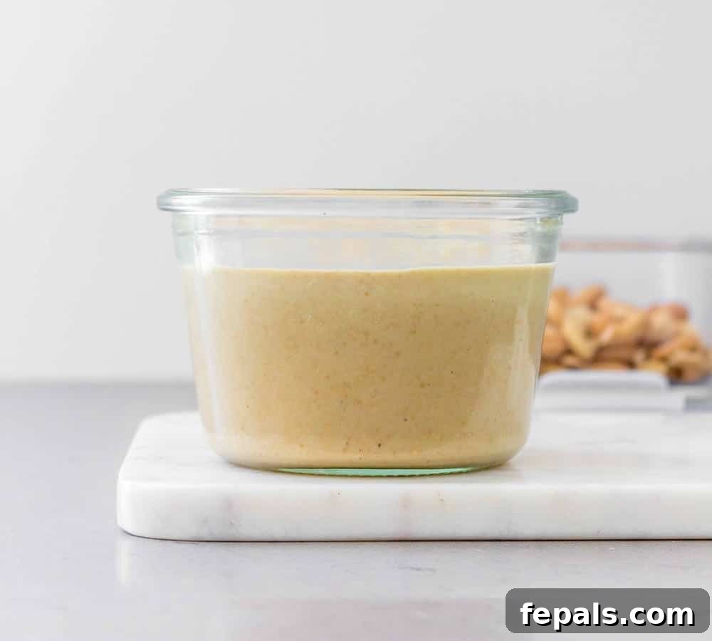 side view of cashew butter in a jar