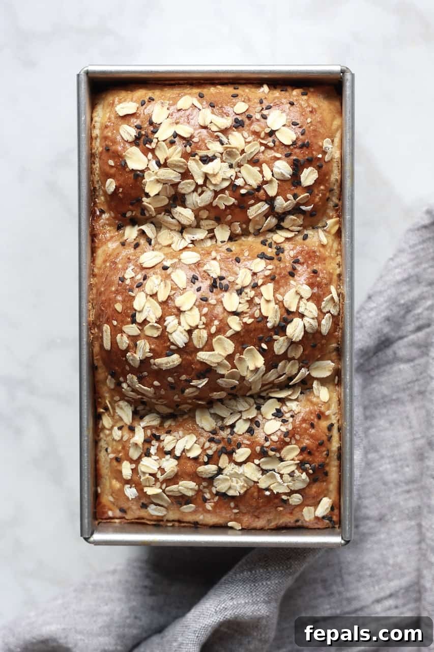 Artisan Whole Wheat Chia Loaf 2 top view of baked wheat bread, showcasing its golden crust and wholesome texture