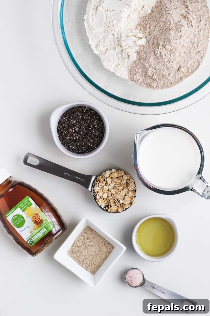 Artisan Whole Wheat Chia Loaf 3 ingredients for chia seed bread arranged on a wooden board