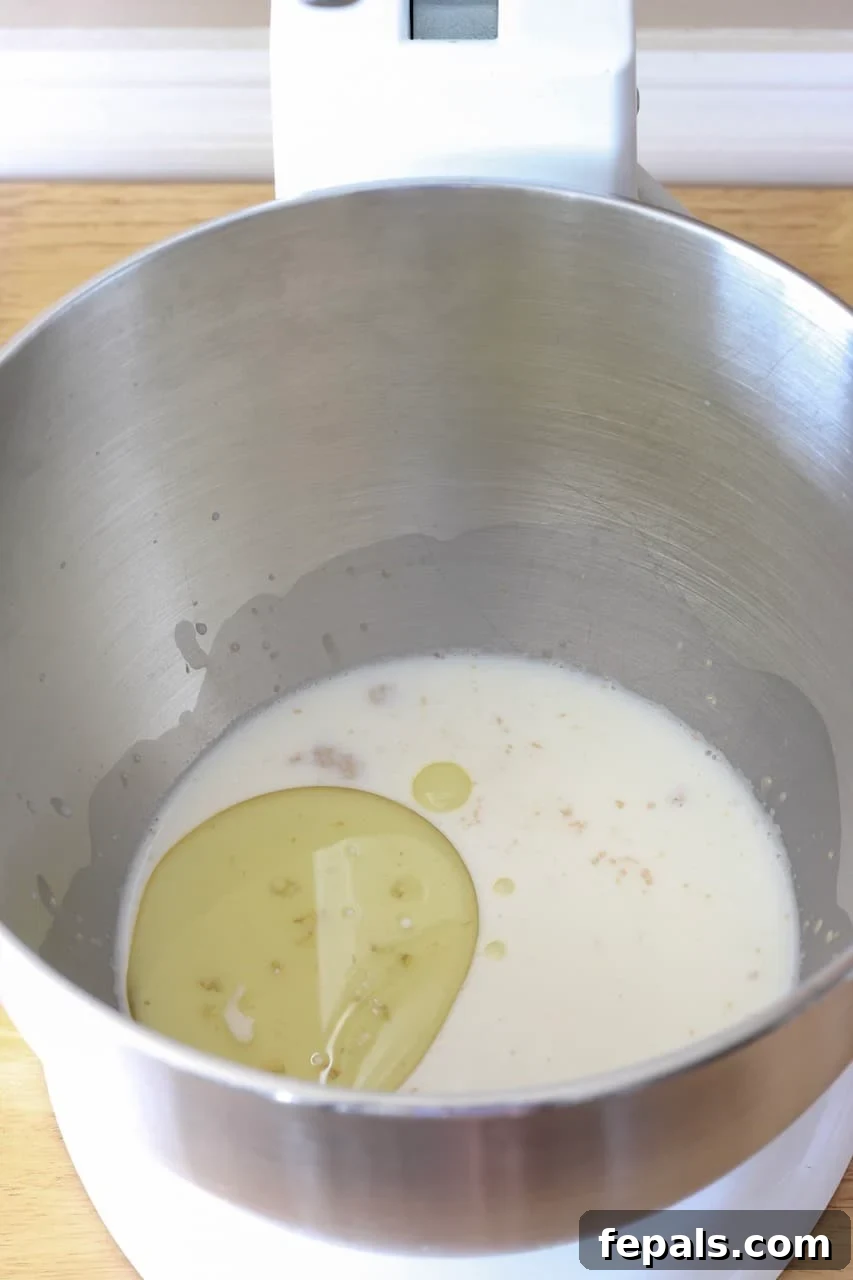 Artisan Whole Wheat Chia Loaf 4 yeast mix in bowl, showing frothy surface after blooming