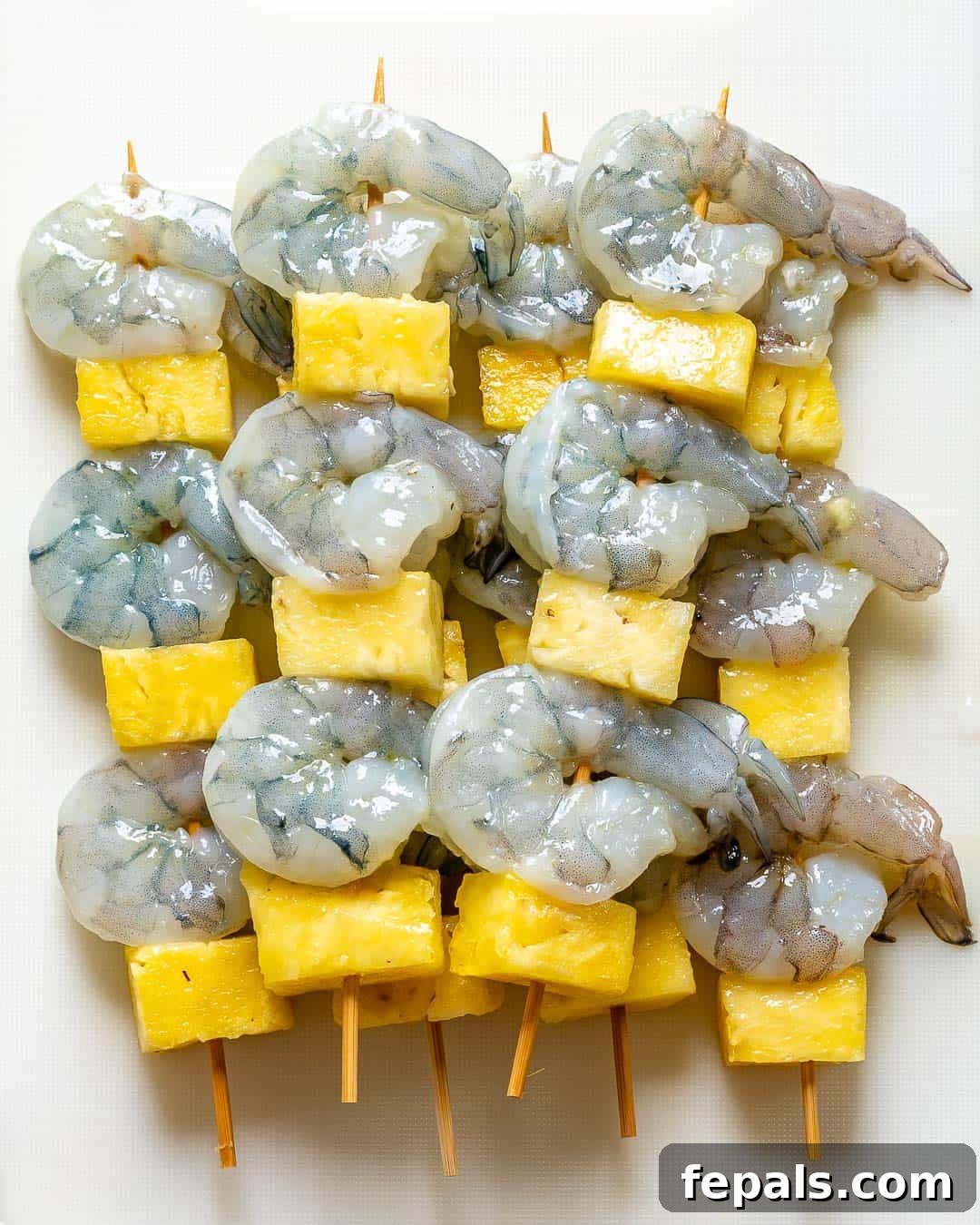 shrimp and pineapple skewers before grilling