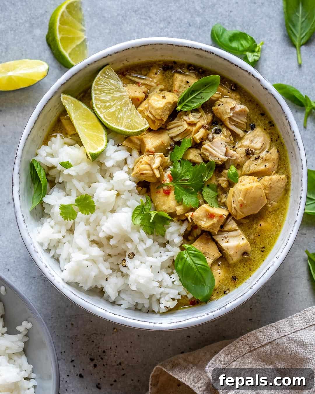 Simple Dairy-Free Instant Pot Chicken Curry 2 Bowl of Instant Pot Chicken Curry served with fluffy white rice, garnished with fresh herbs