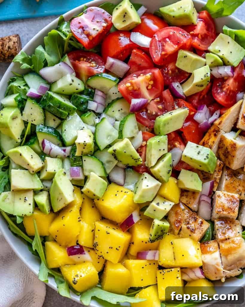 Sunshine Grilled Chicken Mango Salad 3 close up chicken and mango salad in a bowl