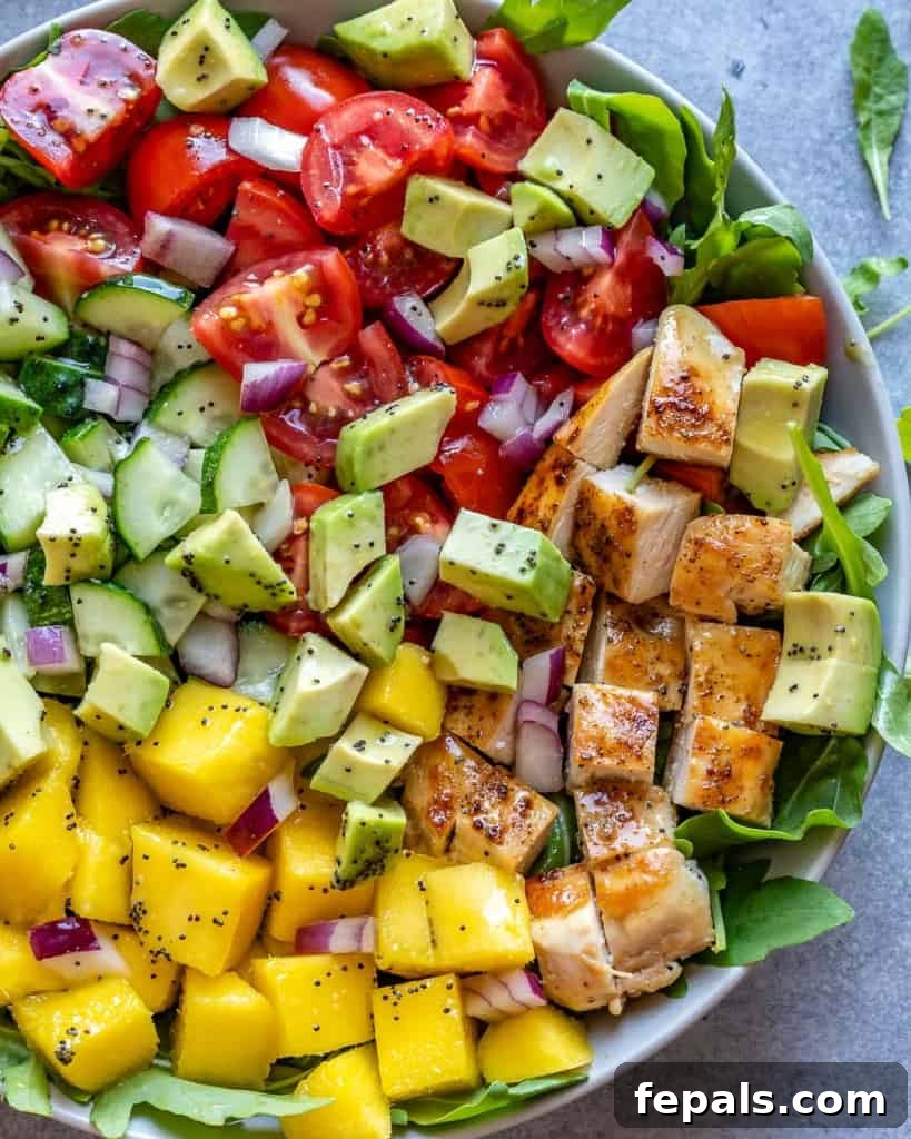 Sunshine Grilled Chicken Mango Salad 7 close up view of salad bowl