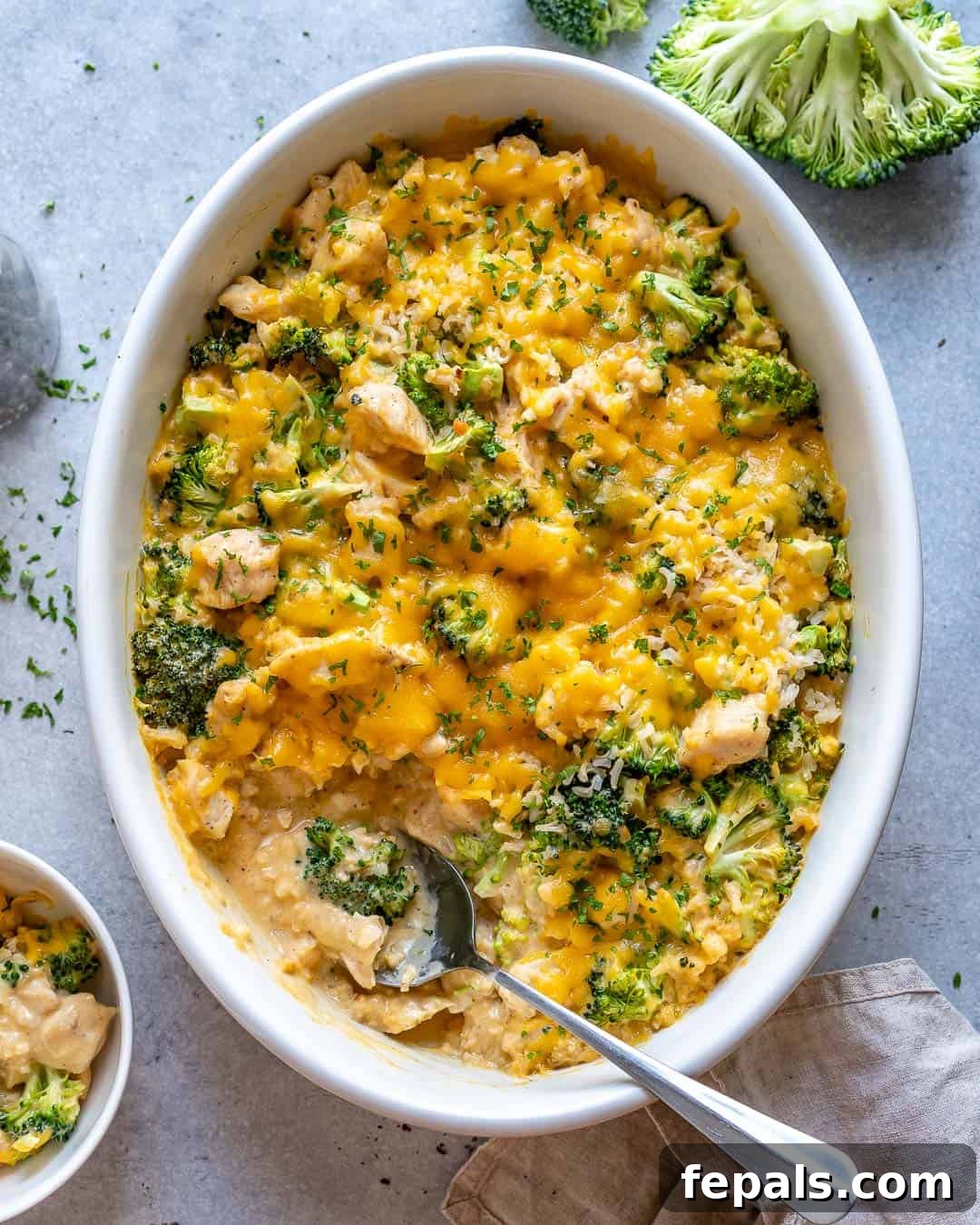 Creamy Chicken Broccoli Rice Bake 2 Chicken & Broccoli Casserole in baking pan on counter