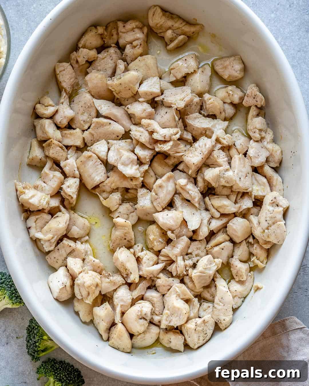 Creamy Chicken Broccoli Rice Bake 5 Season chicken and bake in casserole dish for 10 minutes.
