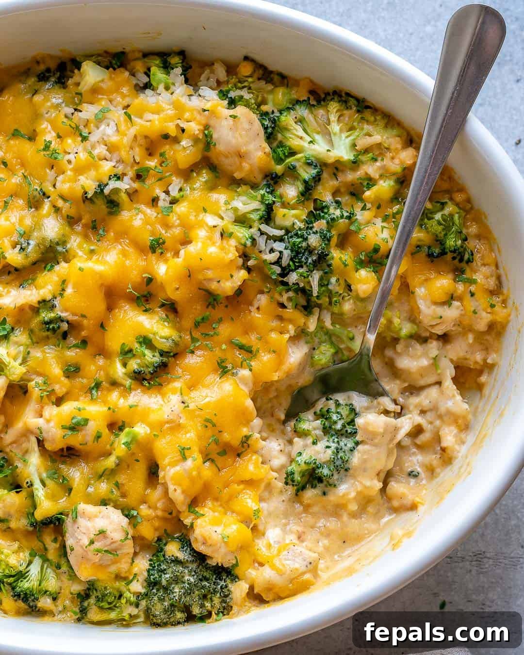 Creamy Chicken Broccoli Rice Bake 10 Side of casserole dish with healthy chicken and broccoli casserole