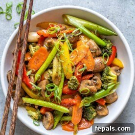 veggie stir fry in white bowl