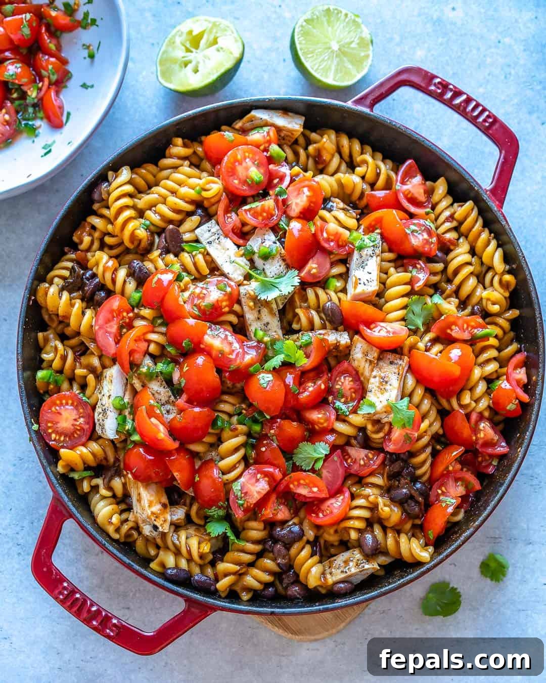 Smoky Chipotle Chicken Pasta 2 Mexican Chipotle Chicken Pasta in large pan with limes on counter
