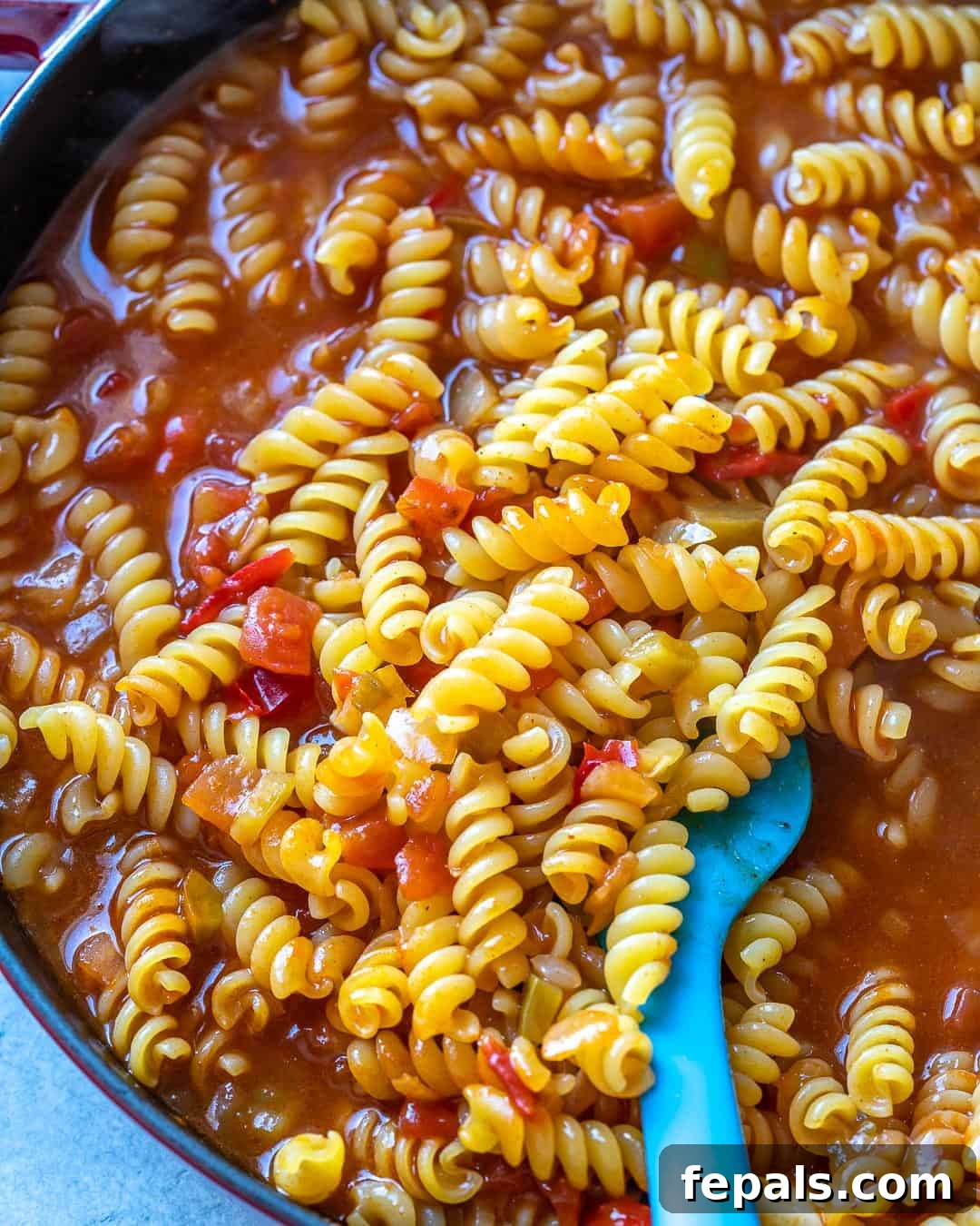 Smoky Chipotle Chicken Pasta 5 Noodles added to pot to cook.