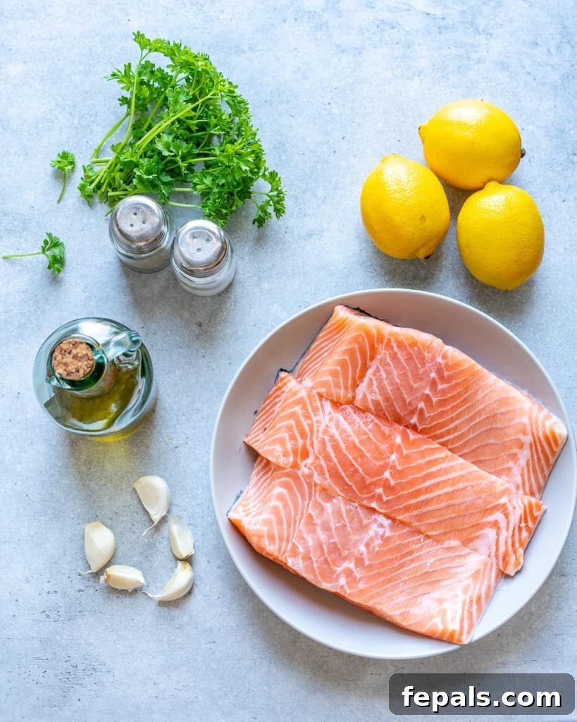 ingredients to make the lemon garlic salmon-salmon filets, lemons, garlic, salt and pepper, fresh parsley