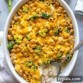 top view of broccoli chicken casserole with spoon in it.