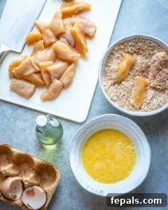 Crispy Air Fryer Chicken Nuggets 8 Chicken pieces dipped in egg then in seasoned breadcrumbs.