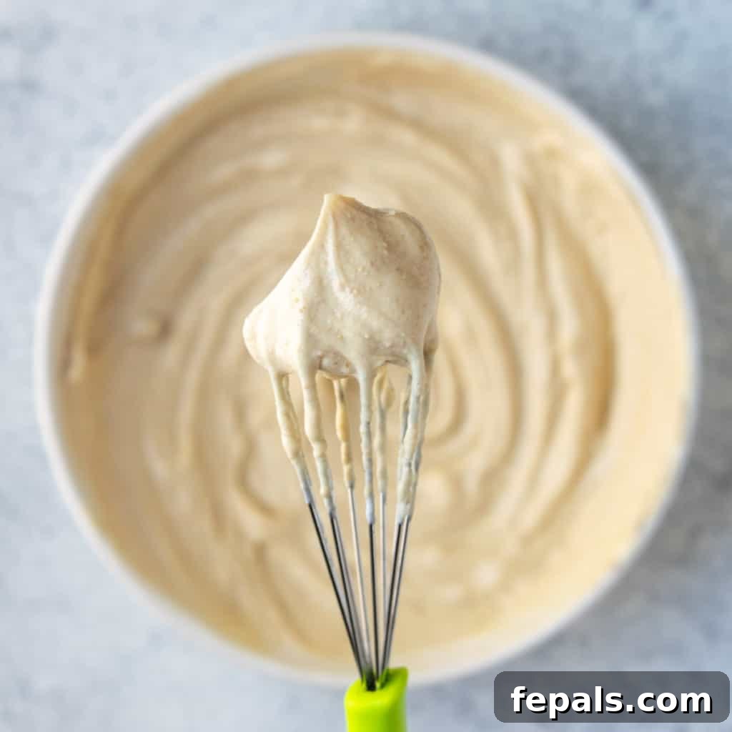 Peanut Butter Bliss Dip 12 whisk with yogurt dip mix in it