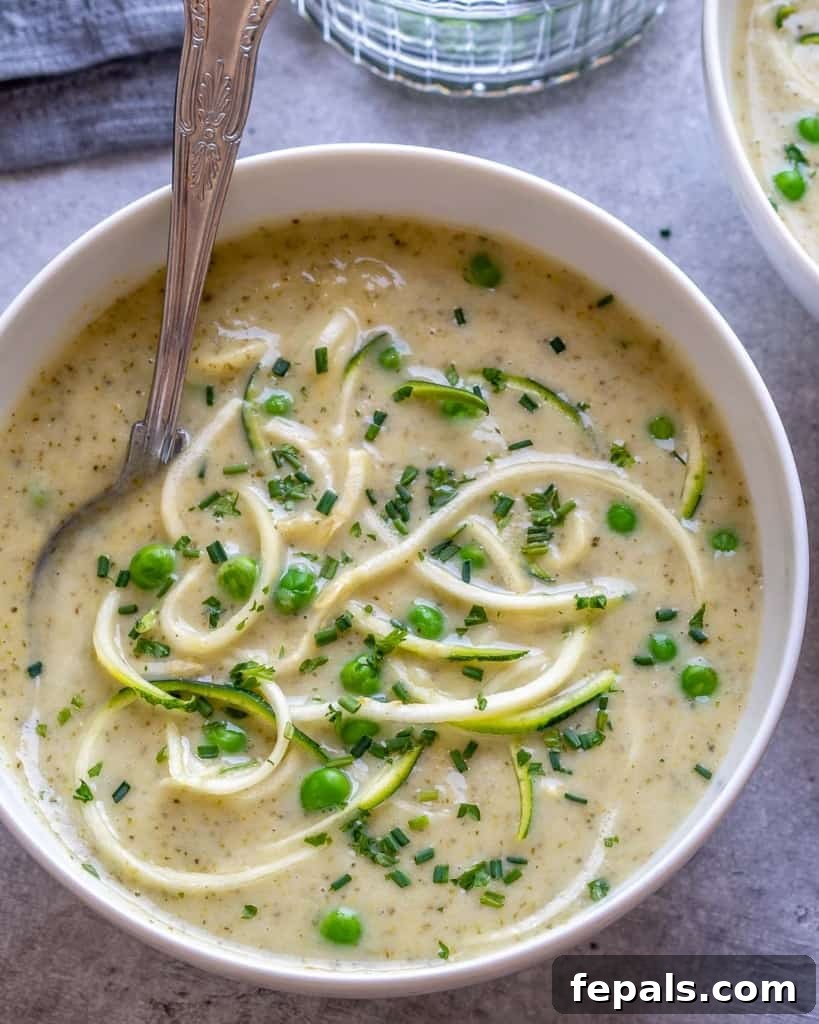 top view spoon in broccoli soup bowl