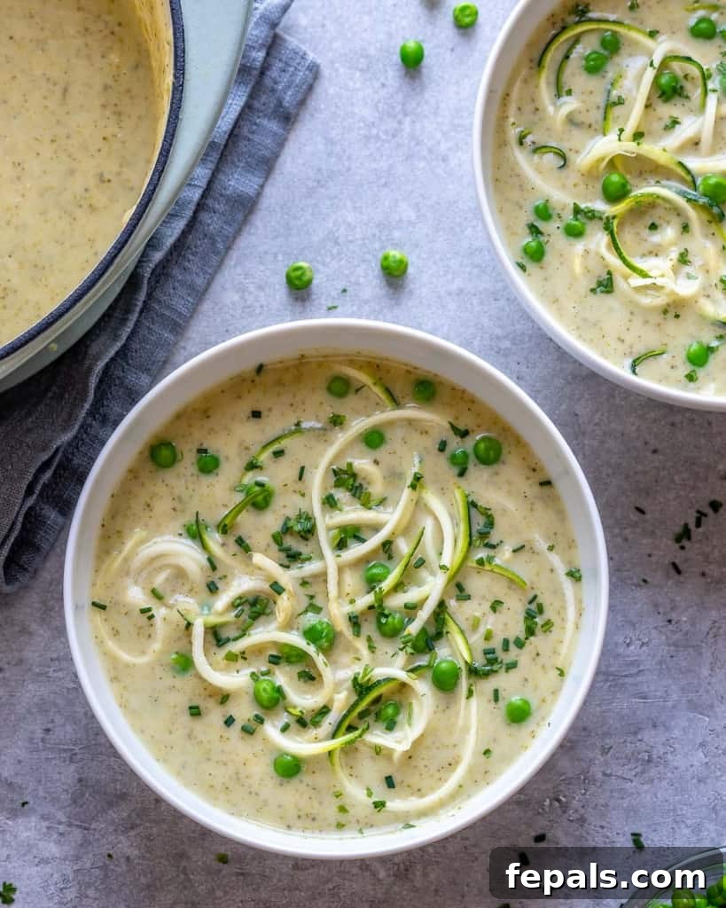 top view of green soup in a white bowl