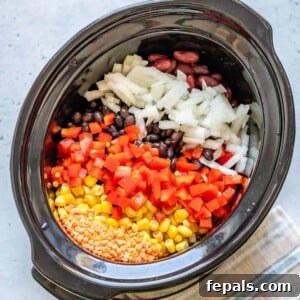 top view of all veggie ingredients added to the crockpot
