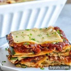 side view of lasagna piece on a plate