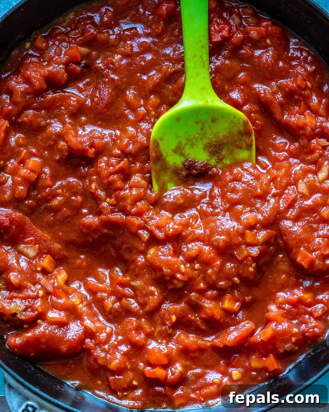 Tomato sauce simmering in pan