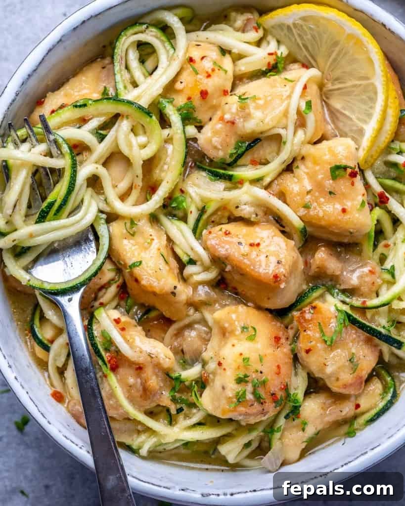 top view of chicken scampi with fork in the zoodle bowl
