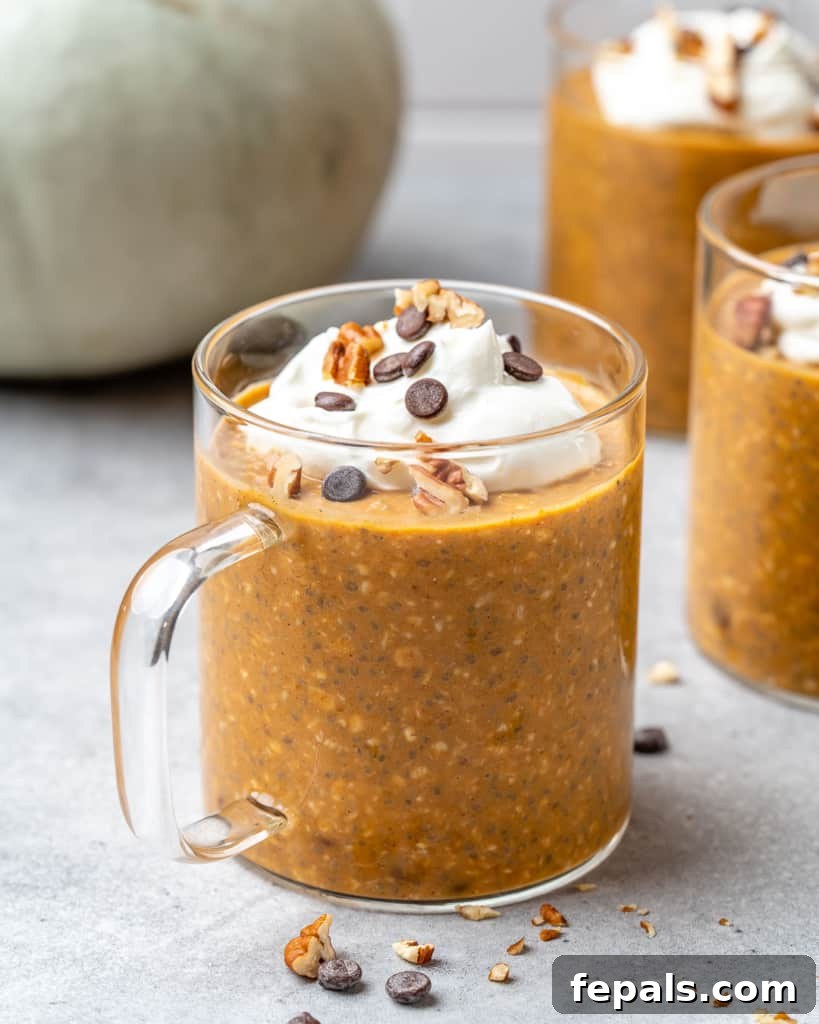 side view of cup full of pumpkin overnight oats