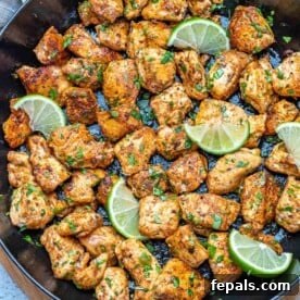 top view chicken bites in a black skillet