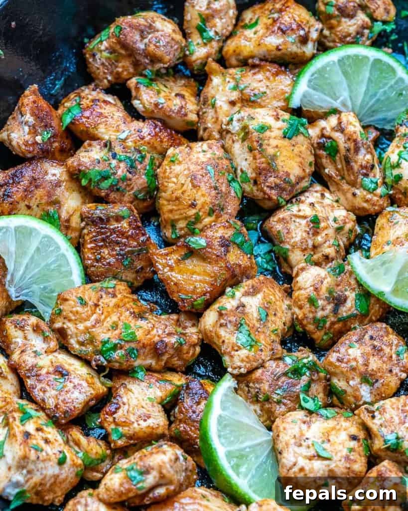 Close-up of perfectly cooked and seasoned cilantro lime chicken bites, showcasing their tender texture