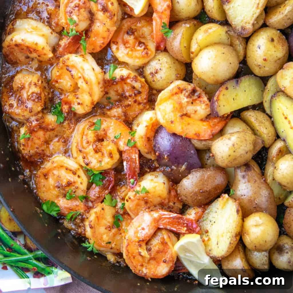 Golden Honey Mustard Shrimp and Crispy Potatoes 11 close up honey shrimps and roasted potatoes