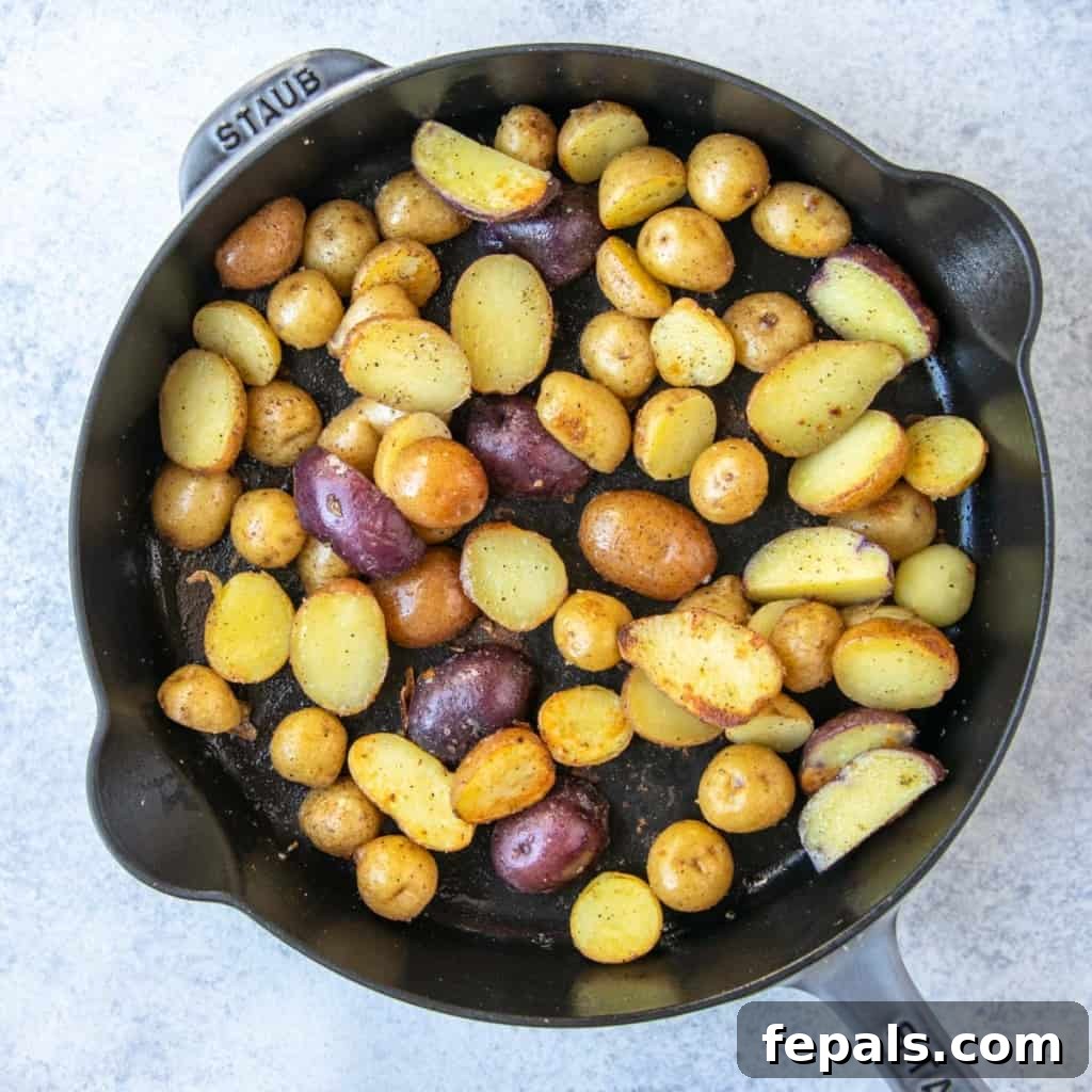 Golden Honey Mustard Shrimp and Crispy Potatoes 6 cut up cooked potatoes in skillet