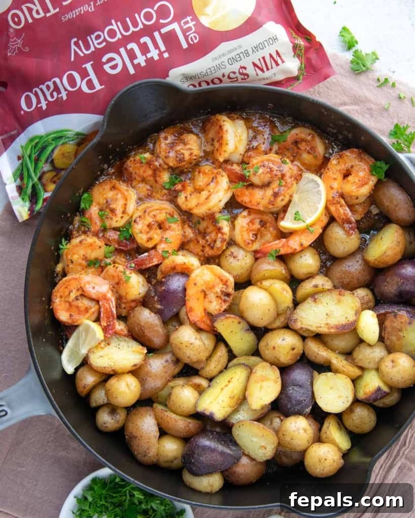 Golden Honey Mustard Shrimp and Crispy Potatoes 9 top view shrimp and potatoes in skillet
